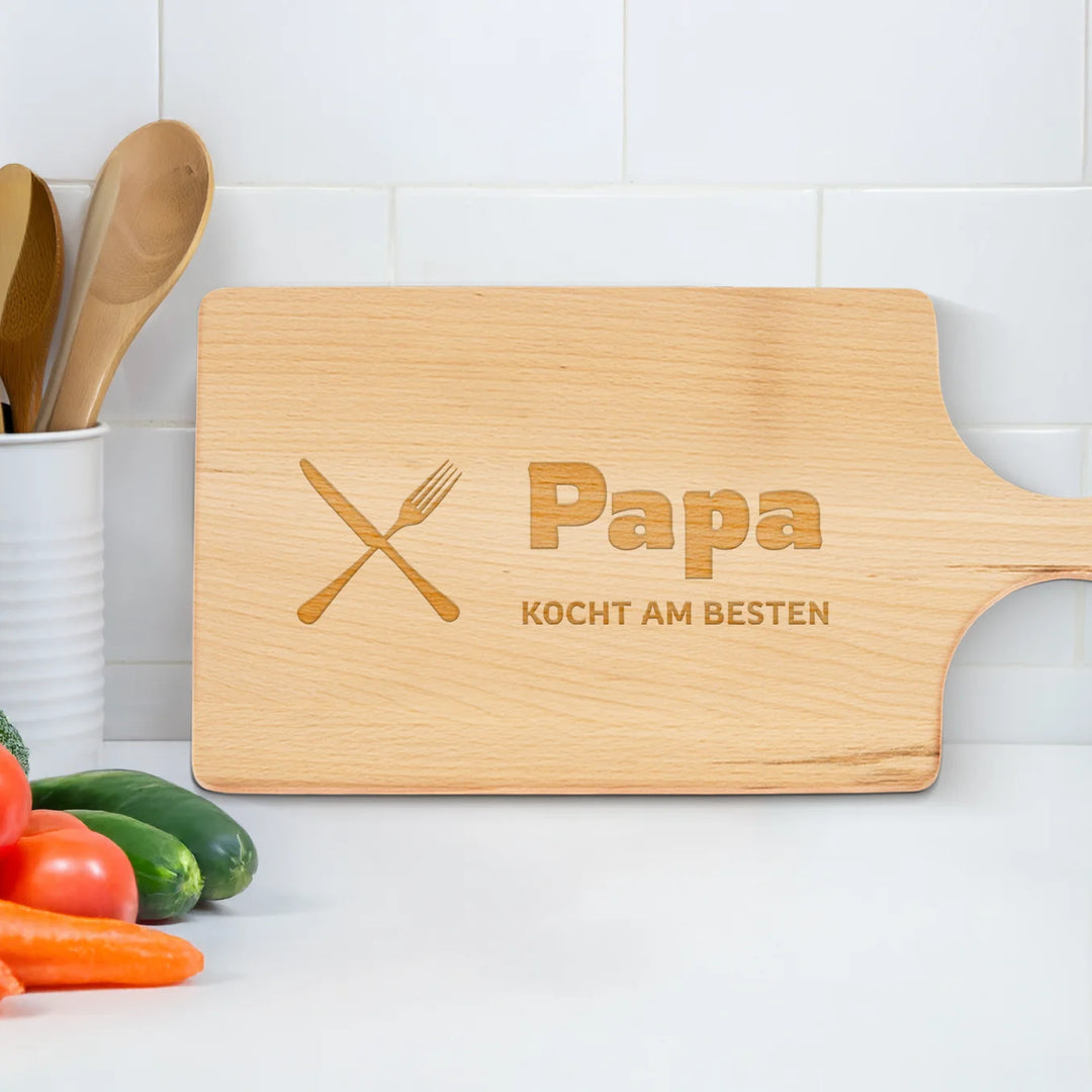 Personalisiertes Schneidebrett “Papa kocht am besten”