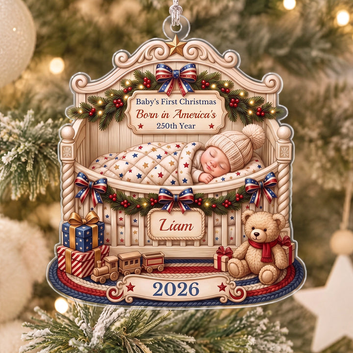 Personalized Ornament "Baby’s First Christmas" for a newborn: sleeping baby in a crib with name, year and Born in America’s 250th Year lettering, famwalls