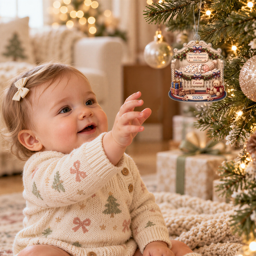 Baby girl reaching for the Baby’s First Christmas ornament on the Christmas tree