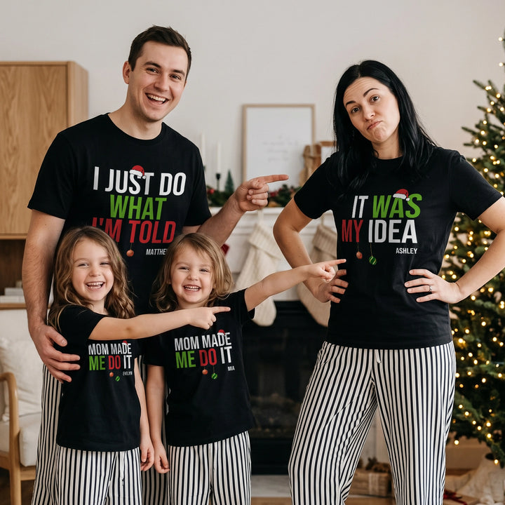 Family in black Christmas shirts with “I just do what I’m told”, “It was my idea” and “Mom made me do it”
