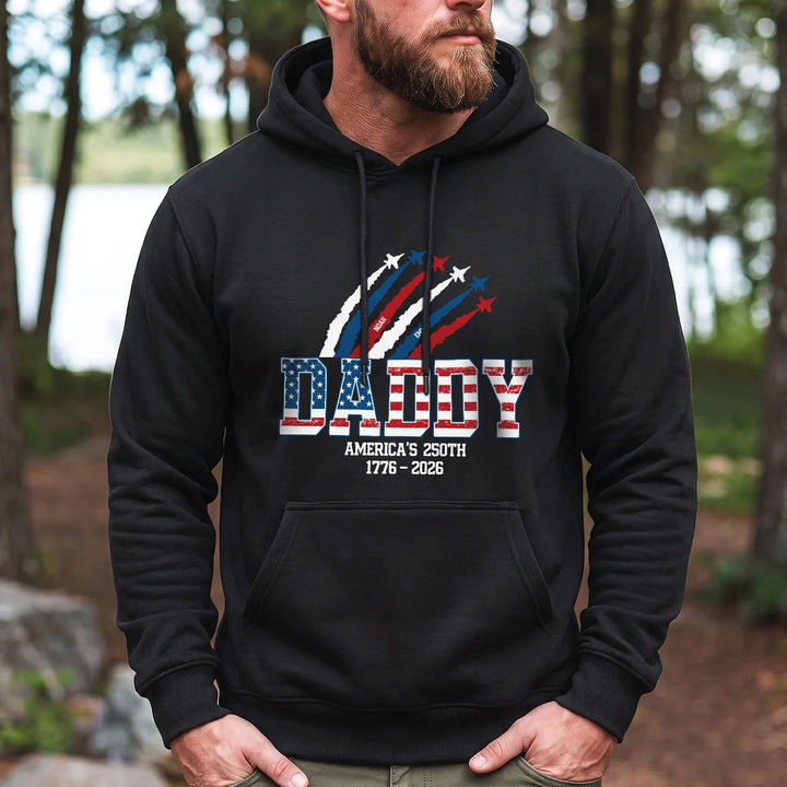 Man in a black American Legend hoodie with DADDY in flag colors and America's 250th