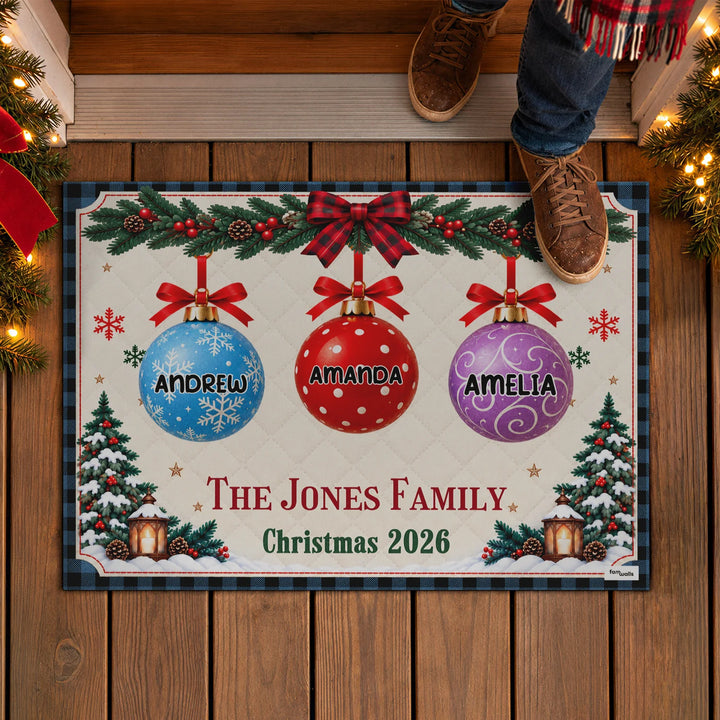 Person in boots stepping onto the Christmas Family doormat with named ornaments