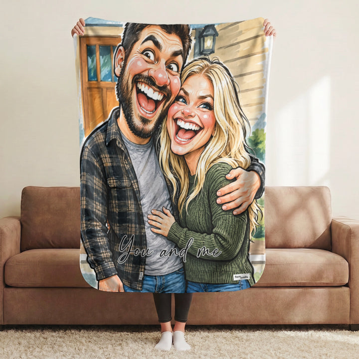 Woman holding up the couple sketch blanket in the living room