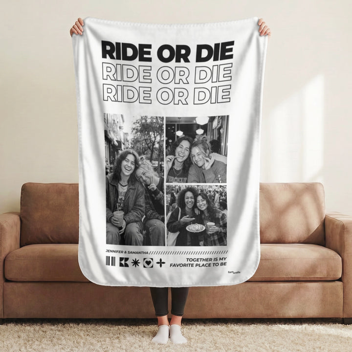 White Ride or Die blanket with photo collage held up in a living room