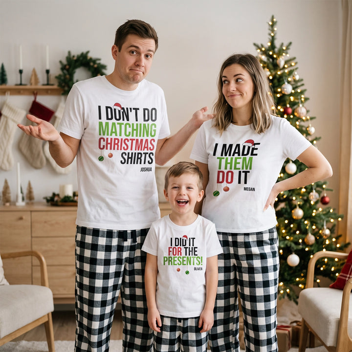 Parents and son in white family Christmas shirts with “I don’t do matching Christmas shirts” and “I made them do it”