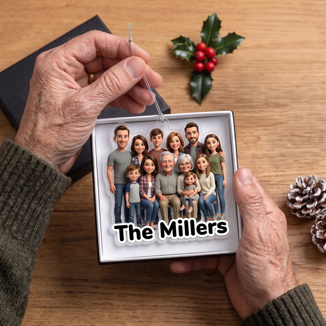 Grandpa holding the Cartoon Portrait ornament with a big family and the name The Millers in a gift box