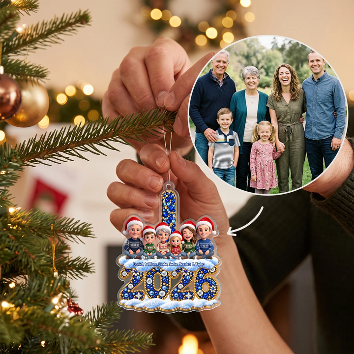 Family photo with grandparents turned into 3D figures on the 2026 ornament, held up at the Christmas tree