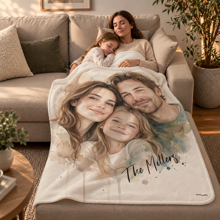 Mother and daughter cuddling on the sofa under the watercolor blanket with "The Millers"