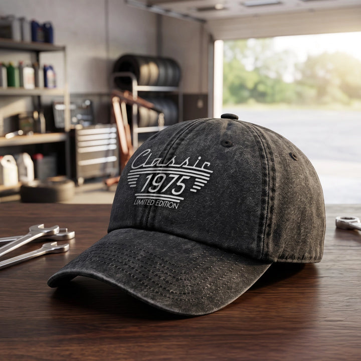 Black Limited Edition cap with the year 1975 on a garage workbench