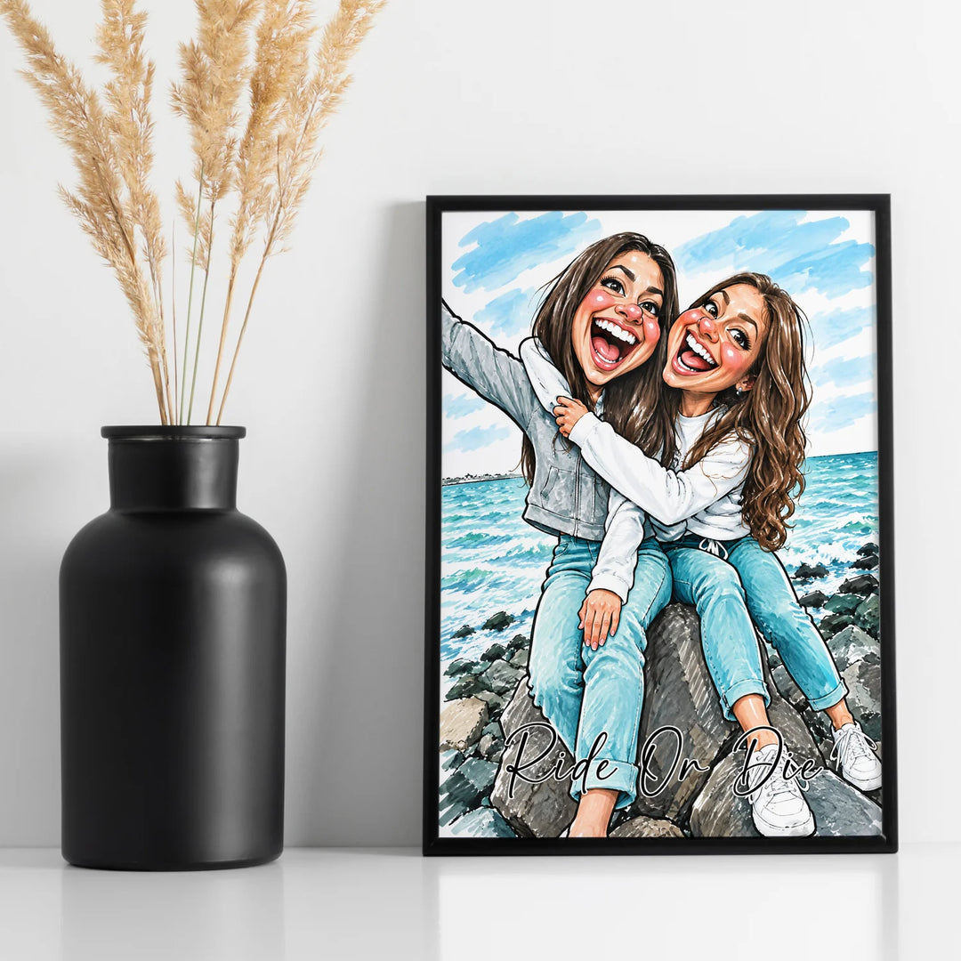 Framed poster of two friends at the beach next to a black vase