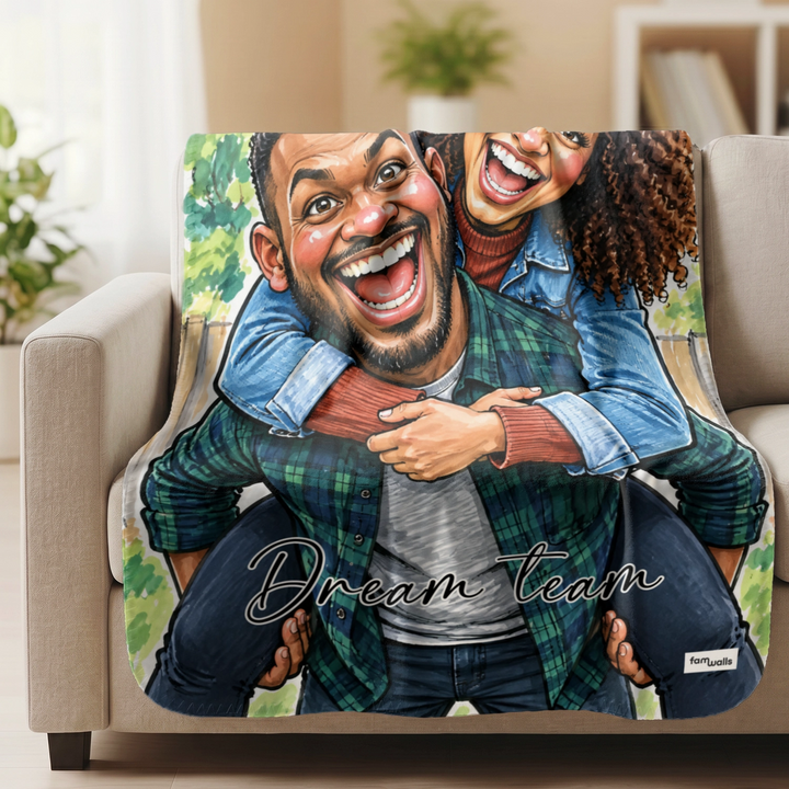 Couple sketch blanket with "Dream Team" draped over a sofa