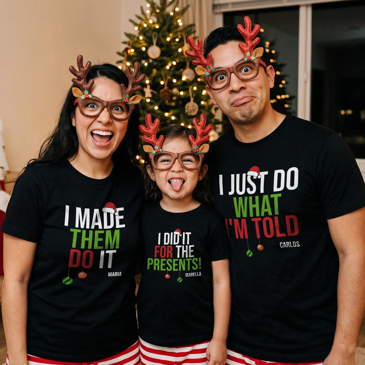 Family with reindeer glasses in black Christmas shirts with funny slogans and names