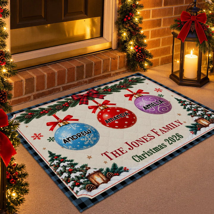 Christmas Family doormat with blue plaid border in front of a festive entrance with lantern